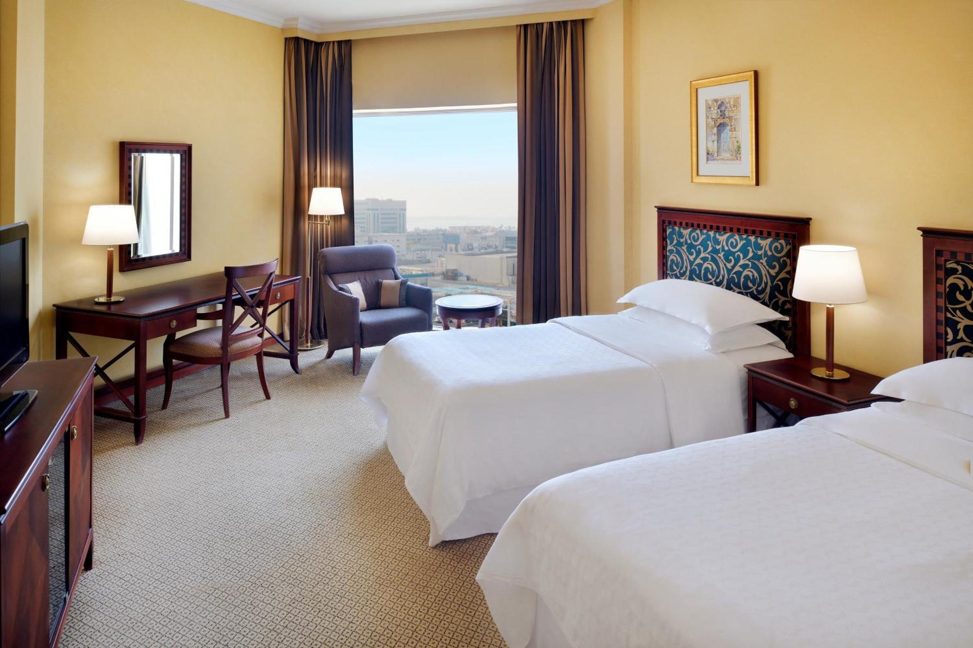 Sheraton Dammam Hotel & Convention Centre Екстер'єр фото A guest room at the Sheraton Riyadh Hotel
